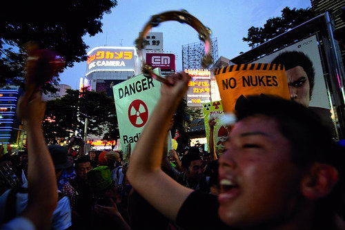 A march/parade, on the three month anniversary of the March 11th earthquake/ tsunami/ and nuclear reactor explosion and melt down at Fukushima Daiichi nuclear plant, takes place in the streets of Shinjuku and Shibuya in Tokyo, Japan, on Saturday 11th June
